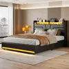 A modern bedroom with a black upholstered bed frame featuring LED lighting. Náhľad obrázku produktu