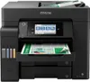 A black Epson EcoTank ET-5805 WLAN-multifunction printer is shown from the front, with a document partially printed and sticking out of the output tray. Náhľad obrázku produktu