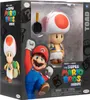 The image shows a product box for a Super Mario Bros. Movie action figure of Toad. The box features artwork of Mario and Toad, along with the movie title and branding. Anteprima dell’immagine prodotto