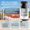 A product shot of a magnesium supplement bottle with promotional text and icons. Produktbild-Vorschau