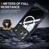 A black phone case is shown on a dark, rocky surface, with debris scattered around. Produktbild-Vorschau