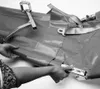 Hands are shown adjusting a foldable stretcher. Produktbild-Vorschau