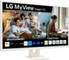 A family and a dog are shown on a bed, with a woman working at a desk in the background, representing entertainment and home office use of the LG Smart Monitor. Produktbild-Vorschau