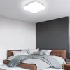 A bedroom scene with a bed and a ceiling light. Anteprima dell’immagine prodotto