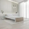 A modern bedroom with a single bed, white slatted wall, and sheer white curtains. Náhled obrázku produktu