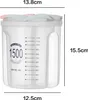 A transparent plastic food storage container with measurement markings and a multi-colored lid. Produktbild-Vorschau