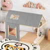 A children's house-shaped bed with gray roof and natural wood frame, set in a child's bedroom with decorative shelves and a rug. Podgląd zdjęcia produktu