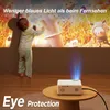 A child is watching a projection from a projector, with text overlay indicating eye protection. Podgląd zdjęcia produktu