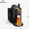 A black and gold beer dispenser with a glass of beer being poured. Podgląd zdjęcia produktu