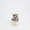A single shoe is shown from the back on a white background. Voir les images du produit