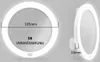 A product image showing a round LED makeup mirror with dimensions and magnification information, and a side view of the mirror attached to a wall with a suction cup. Produktbild-Vorschau