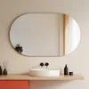 A bathroom vanity with a sink, mirror, and accessories. Produktbild-Vorschau