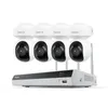 A white security camera system with four cameras and a base unit, displayed on a white background. Produktbild-Vorschau