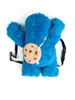 A plush toy backpack shaped like Cookie Monster from Sesame Street, shown from the back. Produktbild-Vorschau