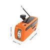 An orange emergency radio with a solar panel and LED flashlight, shown from a diagonal angle against a white background. Dimensions are indicated with text overlays. Voir les images du produit