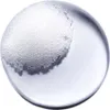 A close-up shot of a clear liquid with foam bubbles. Produktbild-Vorschau