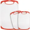 Three white cutting boards with red trim and handles are arranged in a staggered formation against a white background. Anteprima dell’immagine prodotto