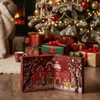 A Christmas scene with a decorated tree, gifts, and an open advent calendar on the floor. Produktbild-Vorschau