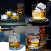 A collage of four images showing whiskey glasses with ice cubes and a bottle of whiskey. Náhled obrázku produktu