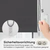 A close-up of a dark gray roller blind with a safety device for the pull cord, and a hand operating the cord. Produktbild-Vorschau
