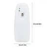 A white automatic air freshener dispenser is shown against a white background, with dimensions indicated. Produktbild-Vorschau