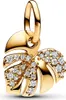 A close-up studio shot of a gold monstera leaf charm with clear stones. Podgląd zdjęcia produktu