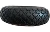 A black tire with a gray rim on a white background. Anteprima dell’immagine prodotto