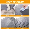 A collage of four images demonstrating how to clean a cat litter mat. Produktbild-Vorschau