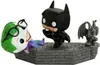 A Funko Pop! diorama featuring Batman and the Joker on a brick-like platform with a gargoyle statue. Podgląd zdjęcia produktu