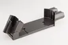 A gray Dyson vacuum cleaner wall mount on a white background. Produktbild-Vorschau