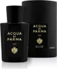 A black perfume bottle and its cylindrical packaging are displayed against a white background. Anteprima dell’immagine prodotto