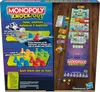 The back of a Monopoly Knockout board game box, showing game pieces, money, and a diagram of the game board. Voir les images du produit