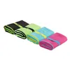 Four folded microfiber towels in different colors arranged in a row. Produktbild-Vorschau