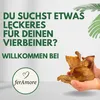 Hands holding dog treats with text overlay. Produktbild-Vorschau
