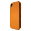 A side view of an orange phone case with the CAT logo embossed on it. Náhled obrázku produktu