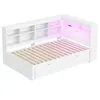 A white bed frame with built-in shelves and LED lighting. Produktbild-Vorschau