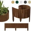 A collection of wooden garden borders and a planter with plants. Voir les images du produit