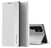 A white flip case for a smartphone is shown, with the back of a silver smartphone visible. Anteprima dell’immagine prodotto