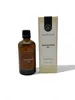 A bottle of cleansing oil and its packaging are shown against a white background. Produktbild-Vorschau