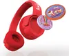 A red Kekz headphones with two decorative discs. Náhľad obrázku produktu