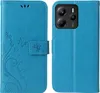 A blue flip cover phone case with a floral and butterfly embossed design is shown open, displaying the inside of the case and the back of a phone with its camera module. Produktbild-Vorschau