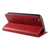 A red leather flip case for a smartphone, shown from the side with the phone inserted and the cover open. Produktbild-Vorschau