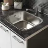 A close-up view of a kitchen sink and countertop. Produktbild-Vorschau