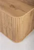 A close-up view of a wooden cabinet with vertical slats and a rounded corner. Anteprima dell’immagine prodotto