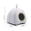 A light gray, pumpkin-shaped pet bed with a green entrance hole, shown in isolation on a white background with dimensions indicated. Produktbild-Vorschau