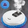 A white robot vacuum cleaner with a blue mop attachment is shown on a wooden floor, emitting steam. Another blue mop attachment is visible in the upper left corner. Náhled obrázku produktu