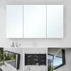A collage of images showing a modern bathroom cabinet with mirrored doors and its interior storage, as well as a view through a window reflected in the mirror and a scenic mountain view from inside a room with a large window. Produktbild-Vorschau