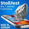 A smartphone screen is shown with a large rock falling onto it, symbolizing impact resistance. Text indicates the product's durability. Produktbild-Vorschau