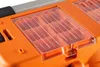 A close-up view of an orange storage case with clear compartments. Produktbild-Vorschau