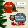 A Christmas tree with gifts and a child decorating it, with marketing text and a brand logo. Náhled obrázku produktu